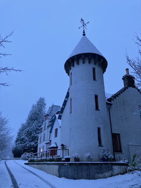 Turreted house in the snow